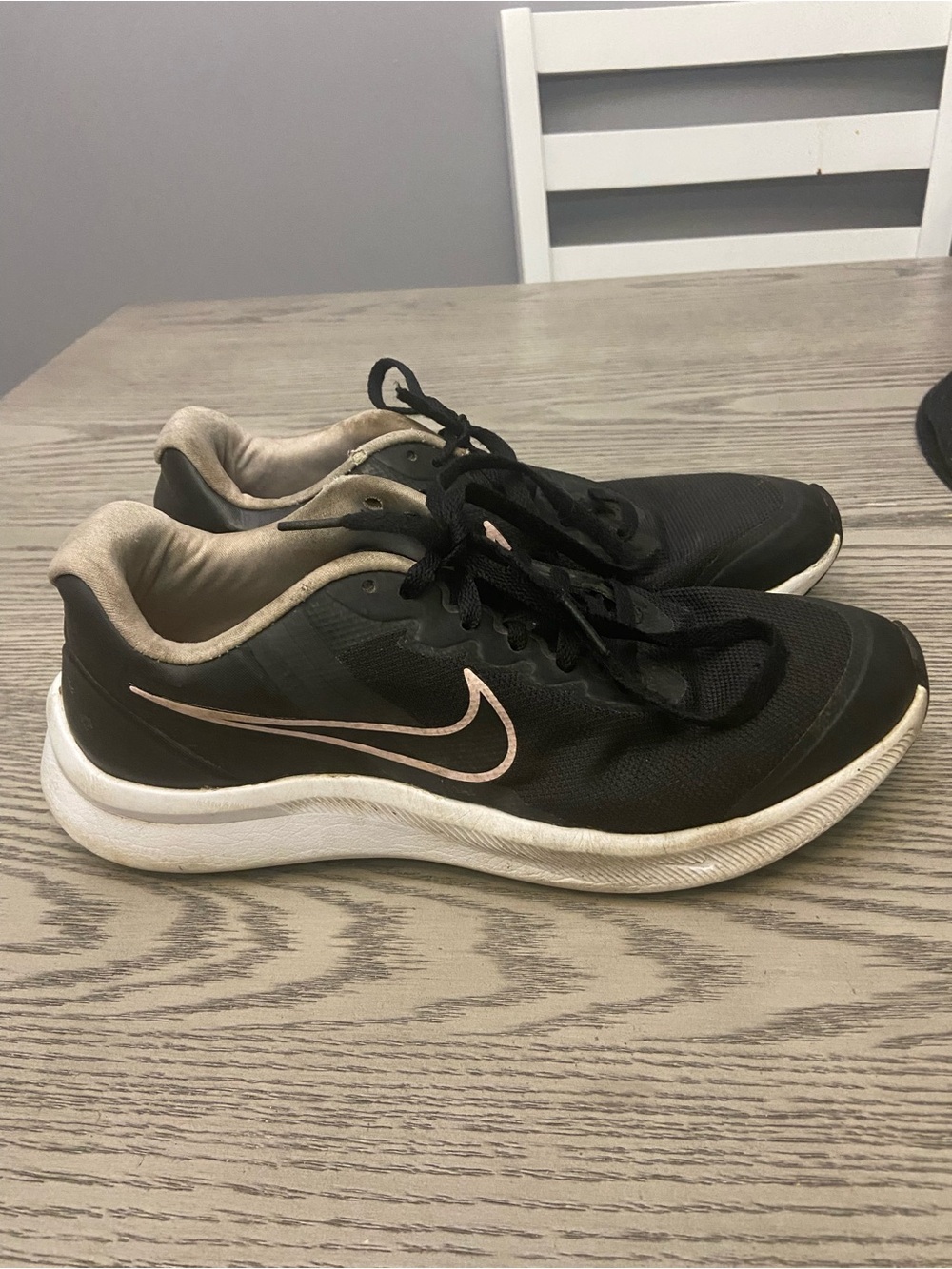 Nike Kids Black Sneakers with Pink Metallic Swoosh